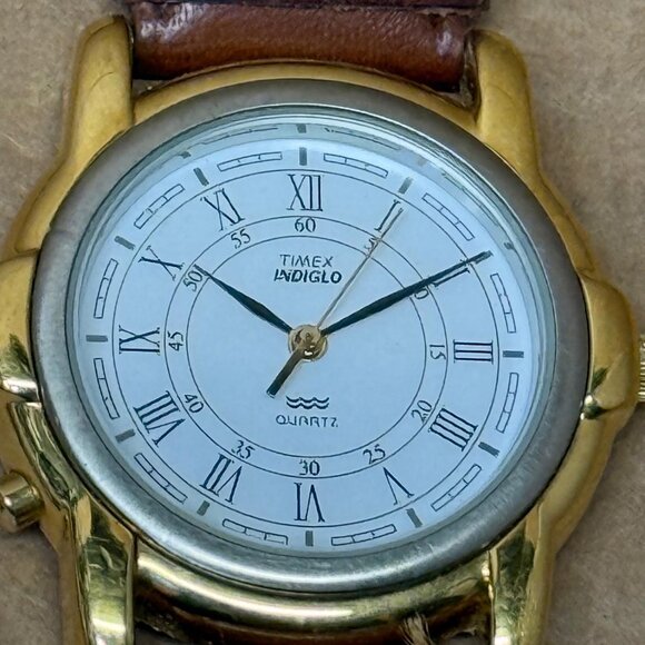 Vintage TIMEX Indiglo Quartz Women\'s Gold Tone Watch (Brown Leather Strap)